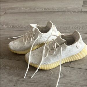 Yeezy White and Yellow Athletic Shoes